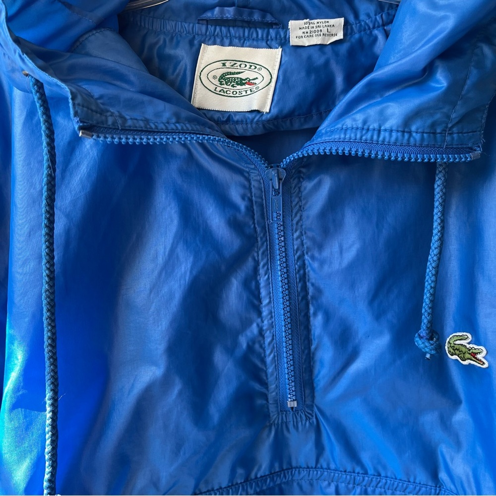 Vintage Lacoste IZOD blue pullover rain slicker.